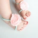These Pink and Mint No Sew Baby Barefoot Sandals are beyond easy to make! Use this tutorial to make them out of many different types of ribbon and flowers! From overthebigmoon.com!