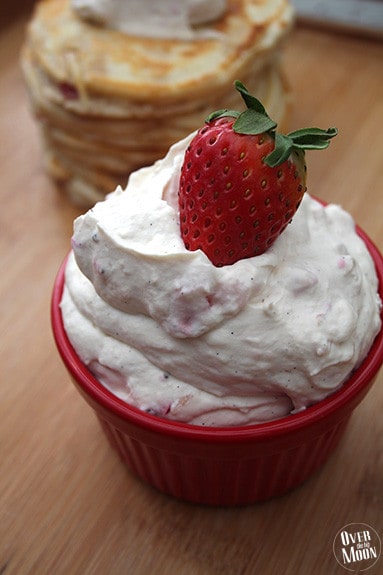 Strawberry Pancakes with Strawberry Vanilla Whipping Cream - this fruit breakfast is subtle, but super tasty! The whipping cream help makes this breakfast perfect! From www.overthebigmoon.com!