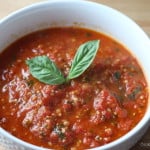 Homemade Pizza Sauce- this sauce is so easy to make and 10x better than store bought! You gotta try this! Recipe at www.overthebigmoon.com!