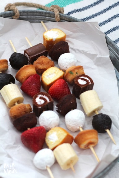 These are awesome! No baking required - just buy desserts and put them on kabob sticks and serve! Plus, the kids love helping assemble them! From www.overthebigmoon.com!