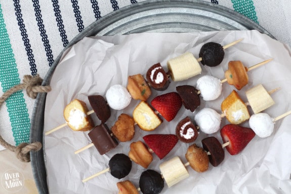 These are awesome! No baking required - just buy desserts and put them on kabob sticks and serve! Plus, the kids love helping assemble them! From www.overthebigmoon.com!