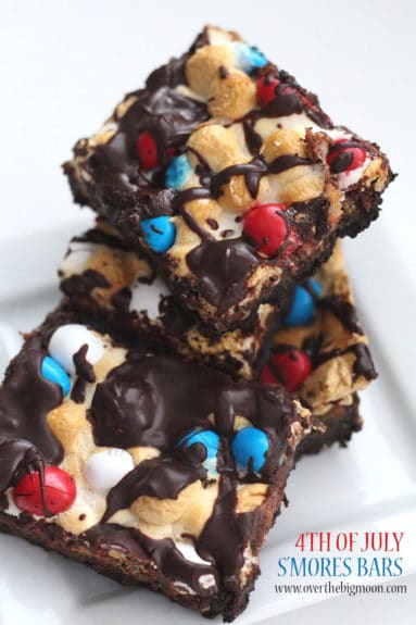 4th of July S'mores Bars! This layered dessert is so tasty and perfect for summer! From www.overthebigmoon.com!
