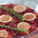 No need to search anymore - this right here is the Perfect Christmas Party Punch! The flavors of this scream Christmas! Also, this can be made family friendly or adult only with just one ingredient change! Full recipe at www.overthebigmoon.com!
