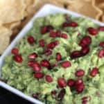 This Pomegranate Guacamole is such a fun change from a traditional guacamole! Especially during the holidays! Check it out! Recipe at www.overthebigmoon.com!