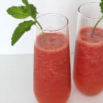 Watermelon Lime Slush is the perfect quick and simple slush to help cool you down in the summer! Recipe at www.overthebigmoon.com!