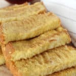 Easy Baked French Toast Sticks - my kids love these! Plus, I'll make them in bulk and freeze little baggies to make for a quick before school breakfast for my kids! | www.overthebigmoon.com