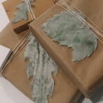 Add a touch of velvet to your gift wrapping with these DIY Velvet Leaf Gift Toppers using a Cricut Maker for a luxe look on your gift!